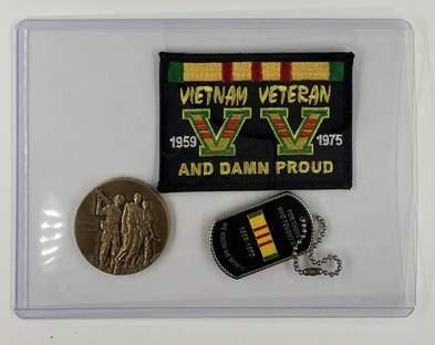 1063- sample of  patch coin tag in sleeve - IMG_1063
